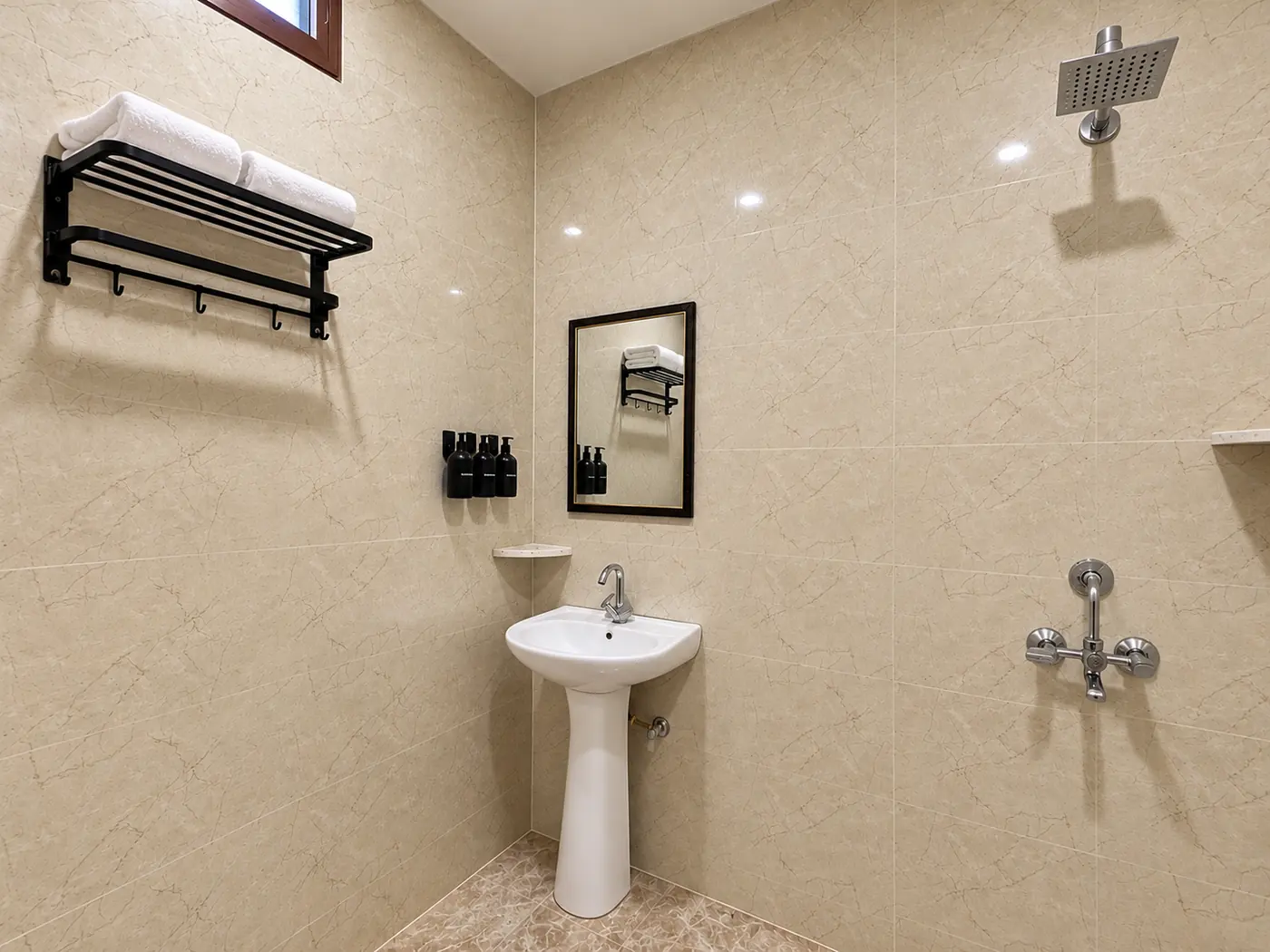 Bathroom with rain shower and toiletries at Mulberry Farm, Noida