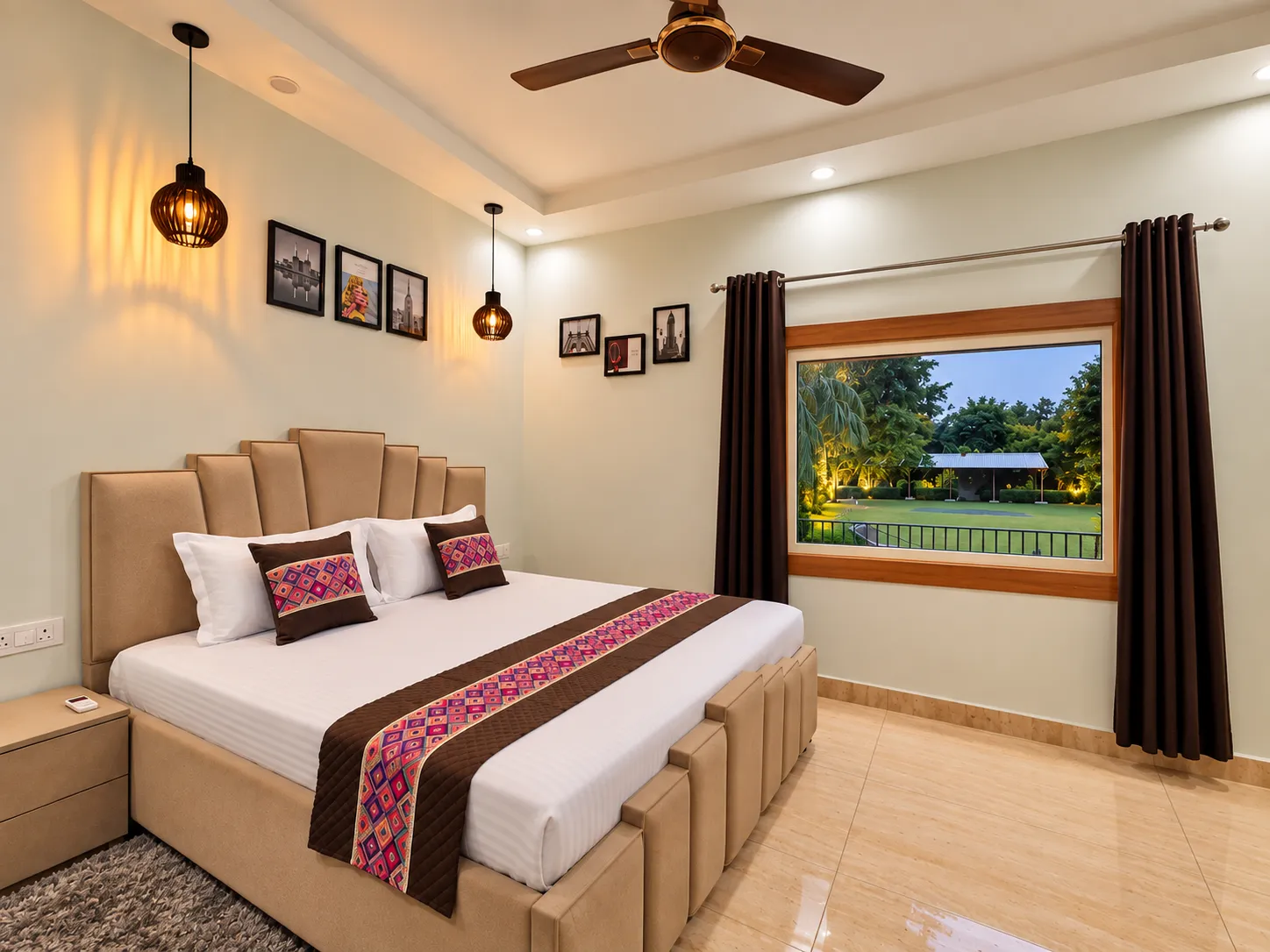 Bedroom two at Mulberry Farm — double bed and a wide window over the lawn, Sector 135 Noida