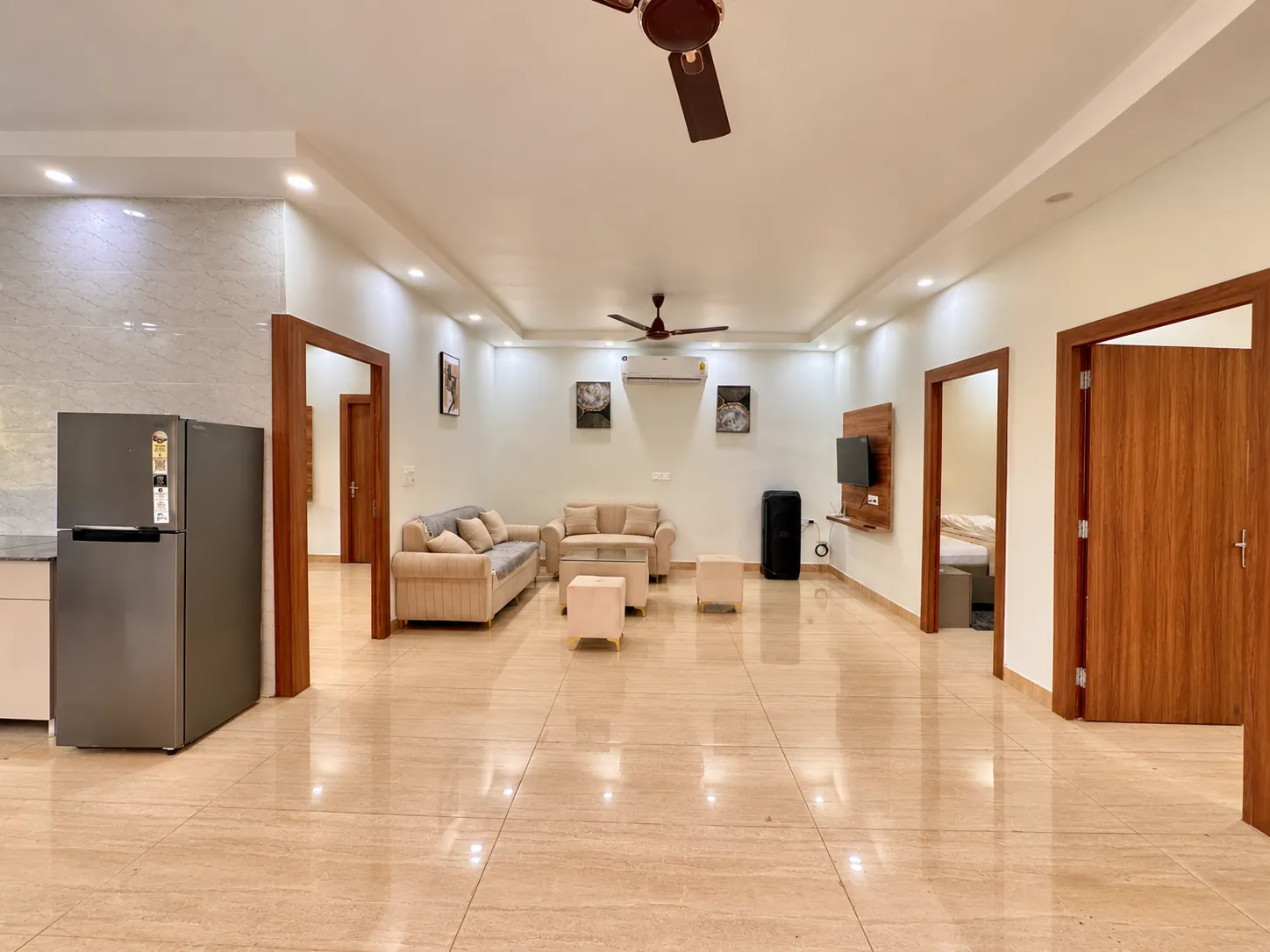 The living room at Mulberry Farm, with doors through to the bedrooms